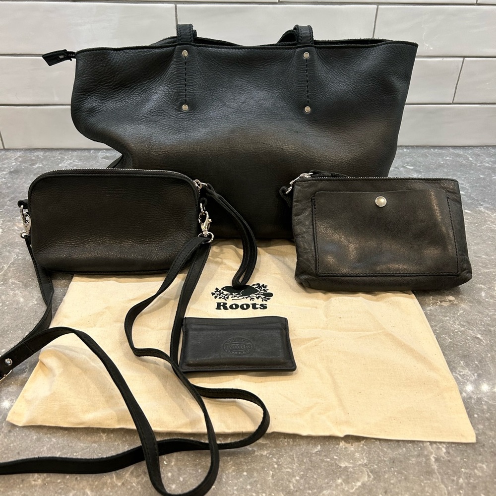 Roots leather west mount tote bag with accessories.
